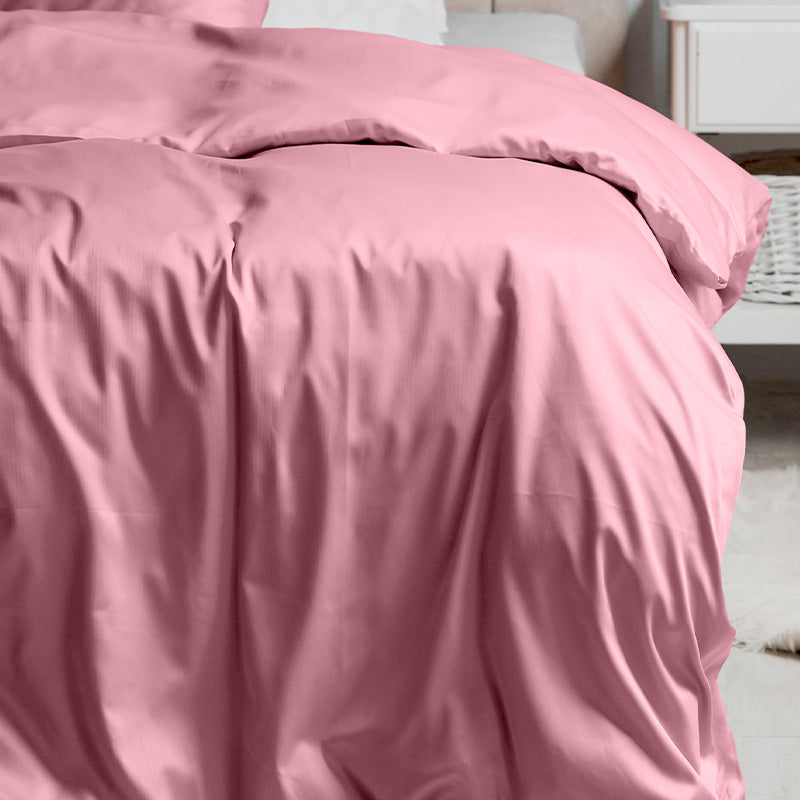 Duvet cover with pillowcases in Coral Pink cotton satin